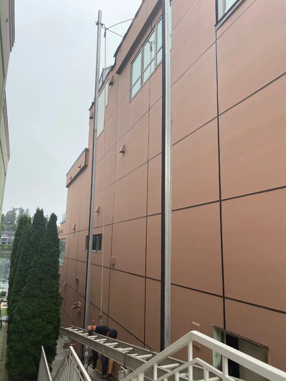Siding installation in progress on a Seattle-area home (photo 1 of 26)