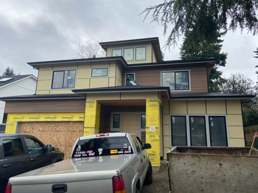 Siding installation in progress on a Seattle-area home (photo 8 of 26)