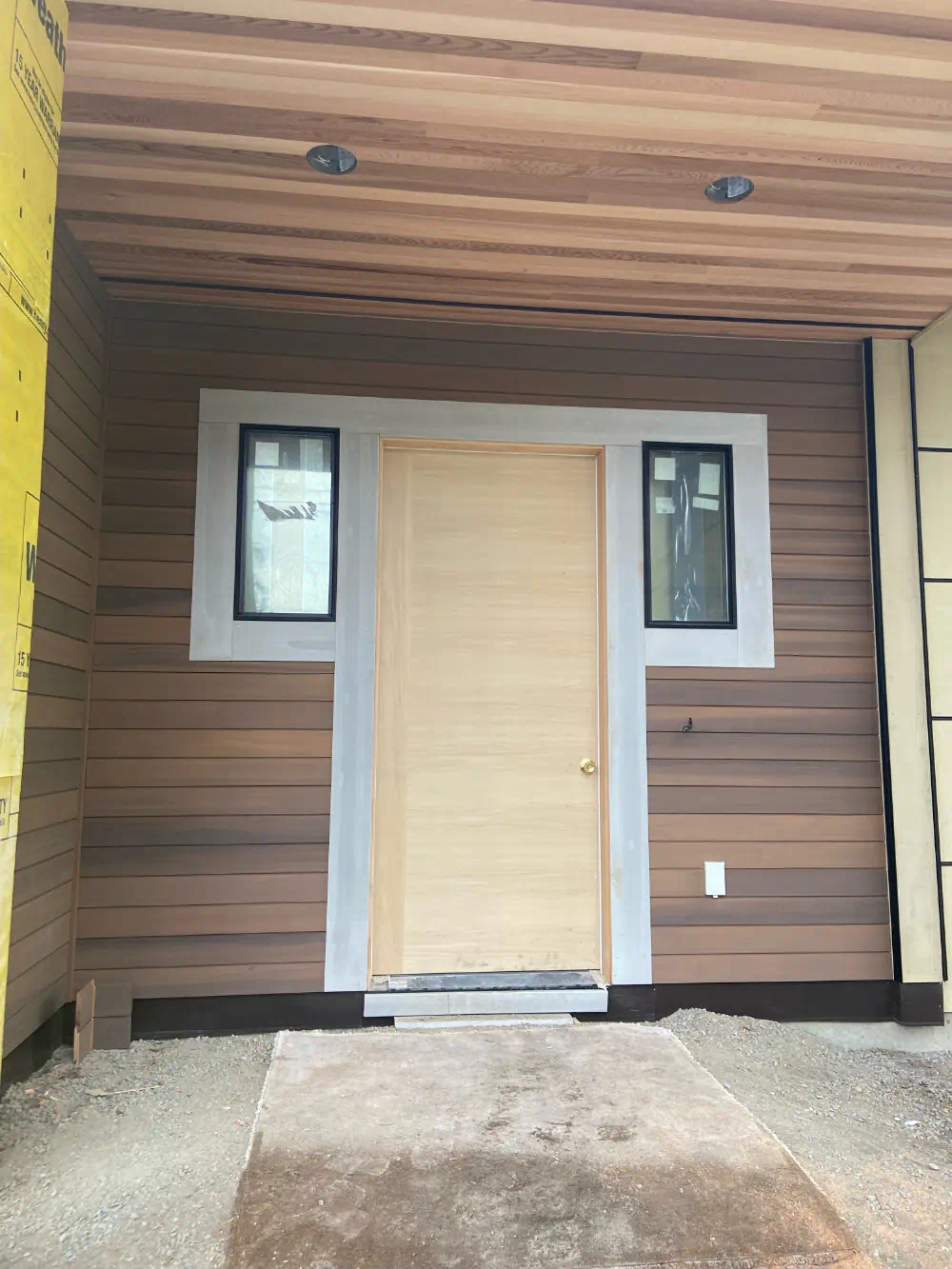 Siding installation in progress on a Seattle-area home (photo 9 of 26)