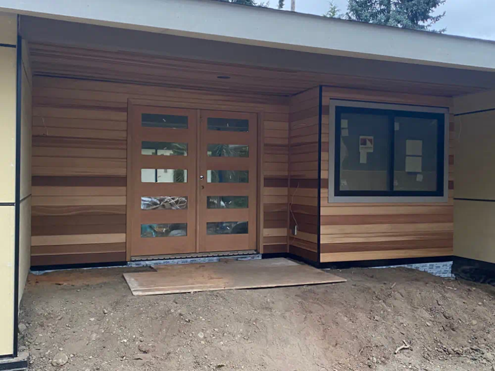 Siding installation in progress on a Seattle-area home (photo 17 of 26)